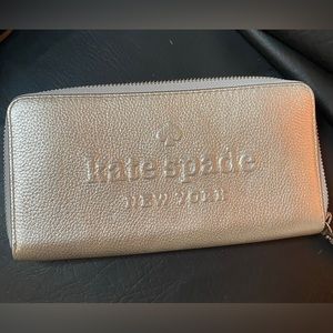 New Kate Spade zip around continental wallet in silver
